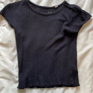 Waffle textured black top.